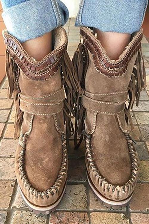 Suede moccasin boots with fringe