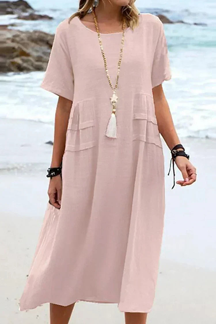 Loose, short-sleeved casual dress with a round neckline and plain colors