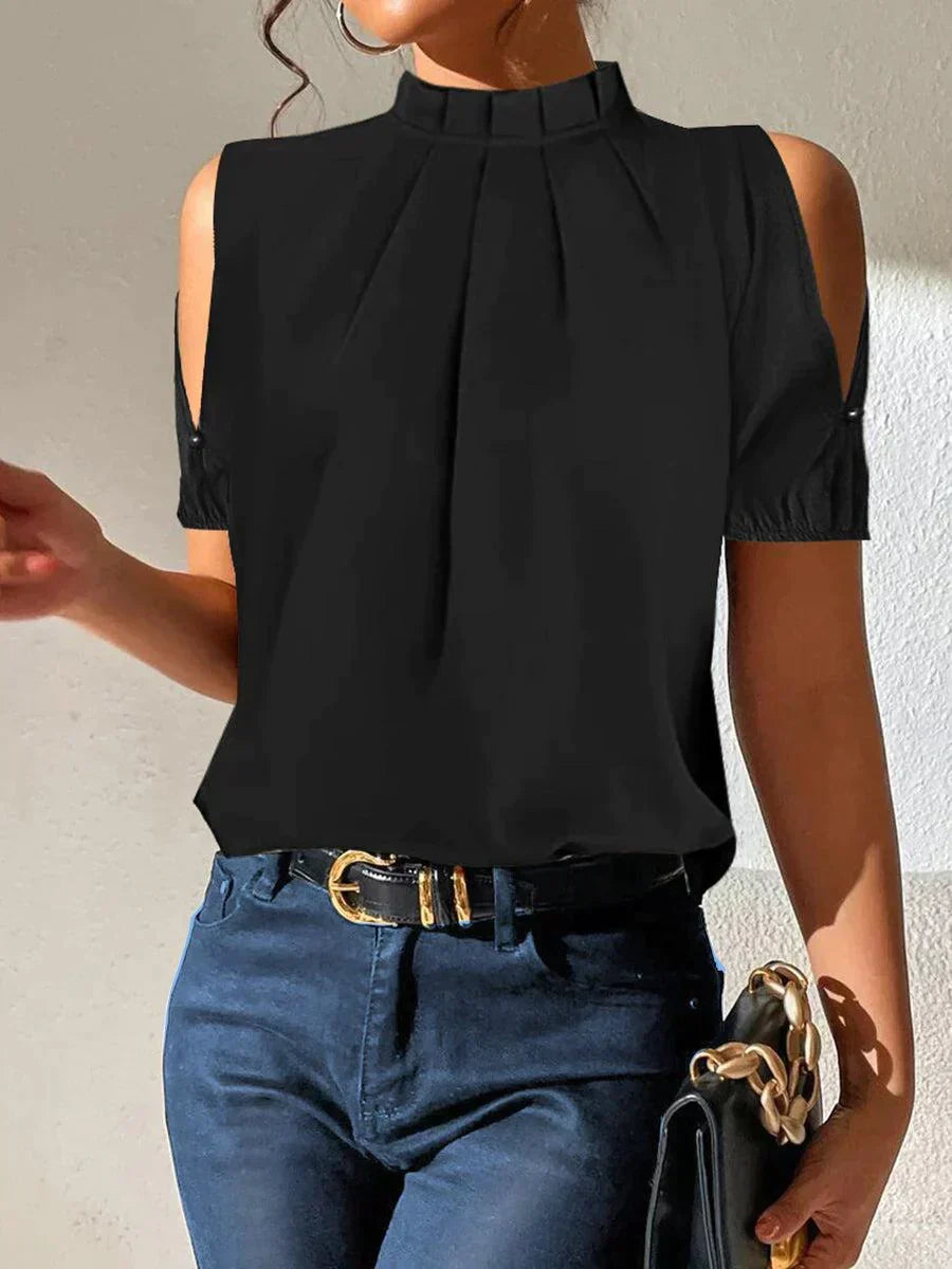 Chic black pleated top with open sleeves