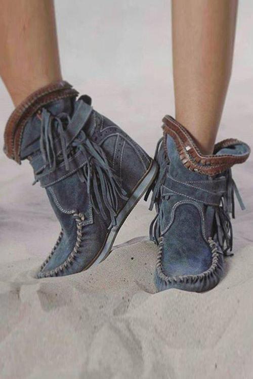 Suede moccasin boots with fringe