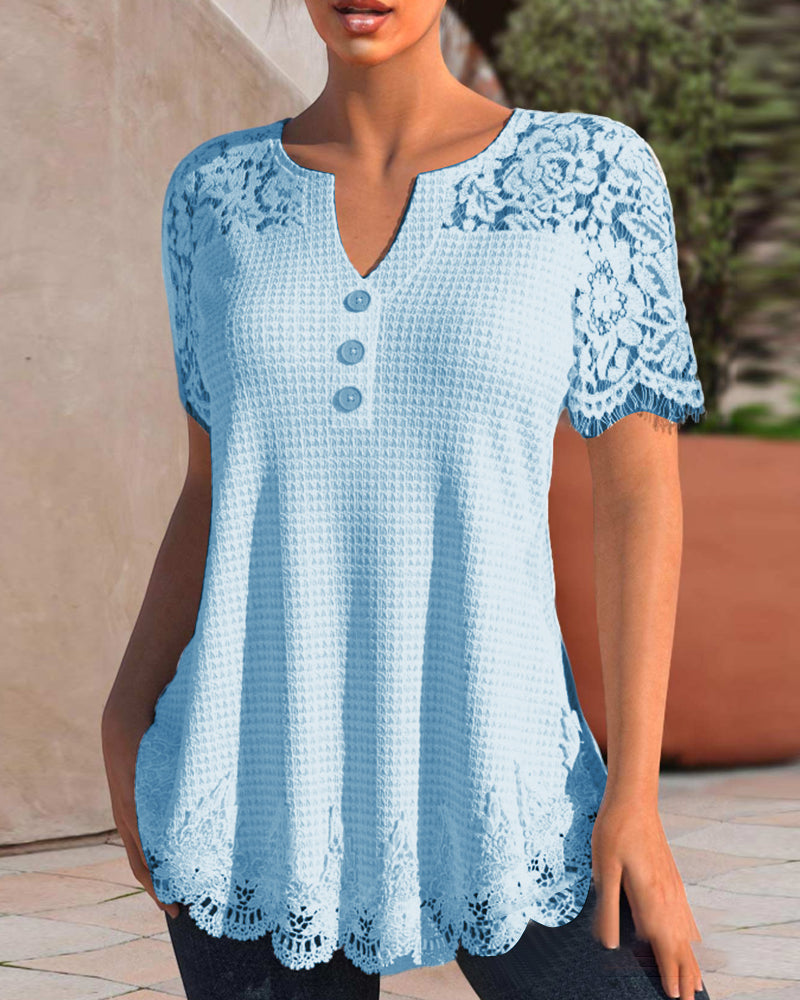 Blouse made of structured lace