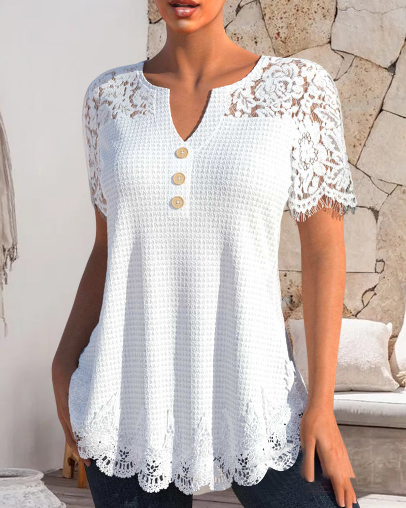 Blouse made of structured lace