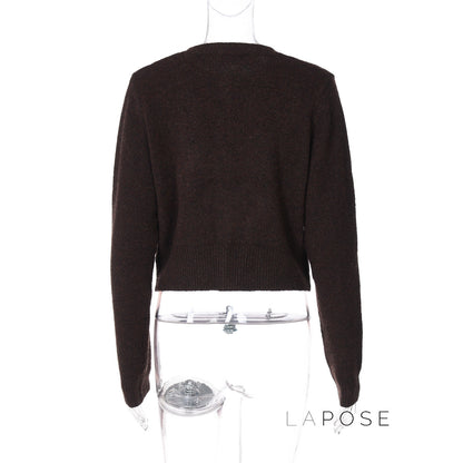 A Vintage Style Cardigan with Delicate Timeless Details