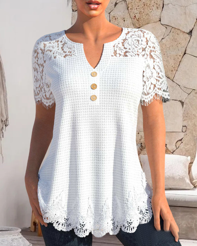 Blouse made of structured lace