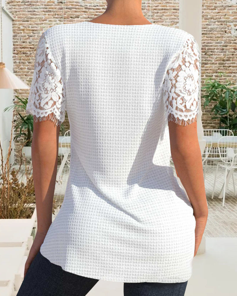 Blouse made of structured lace