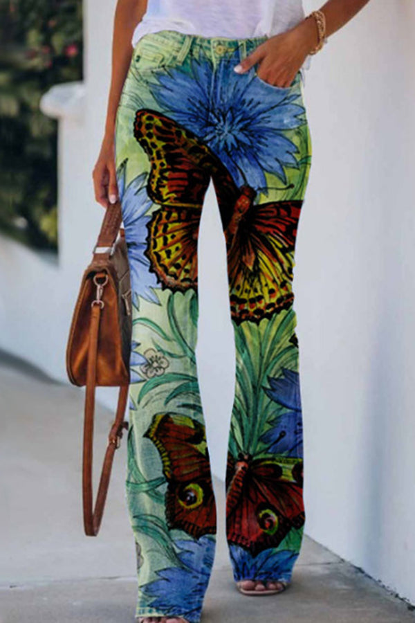 High-waisted flared trousers in faux print