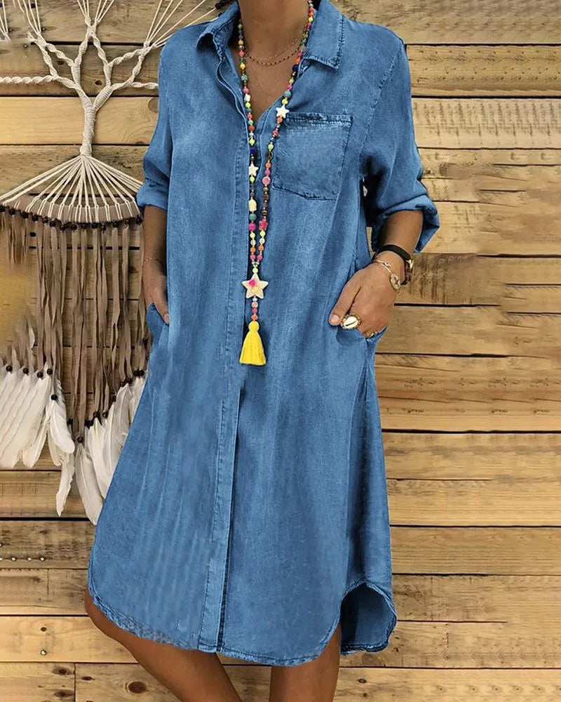 Denim midi dress with rolled-up sleeves and a chest pocket.