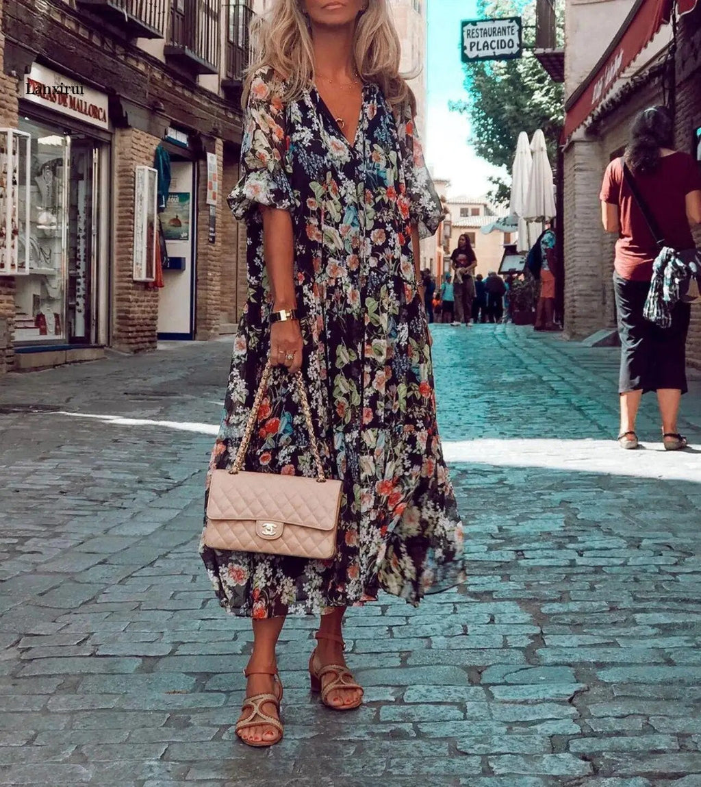Maxi dress with V-neck and floral pattern