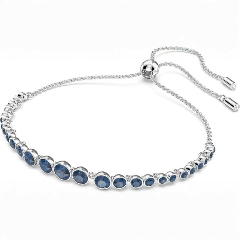 Round Cut Sapphire Tennis Bracelet In White Gold