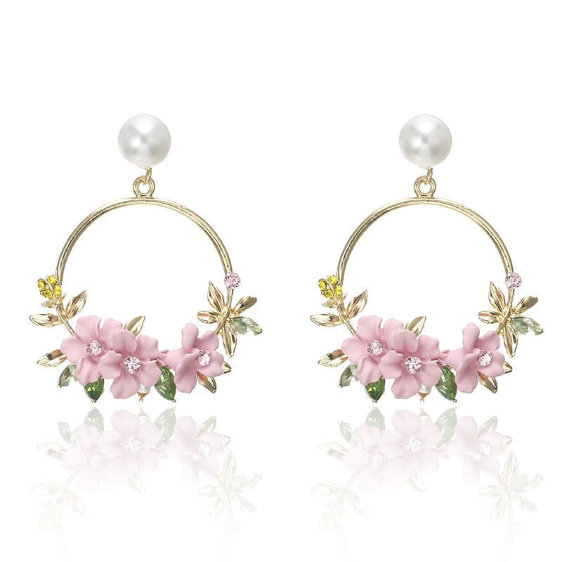 Flower And Pearl Earrings In Gold