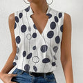 KS | sleeveless top with floral print and V-neckline