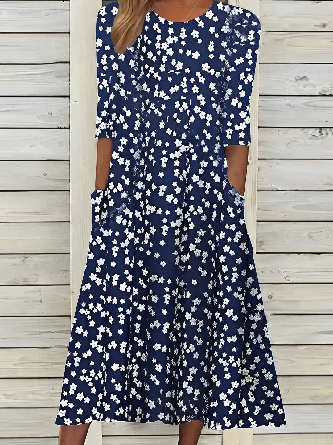 Printed midi dress with round neckline and pockets