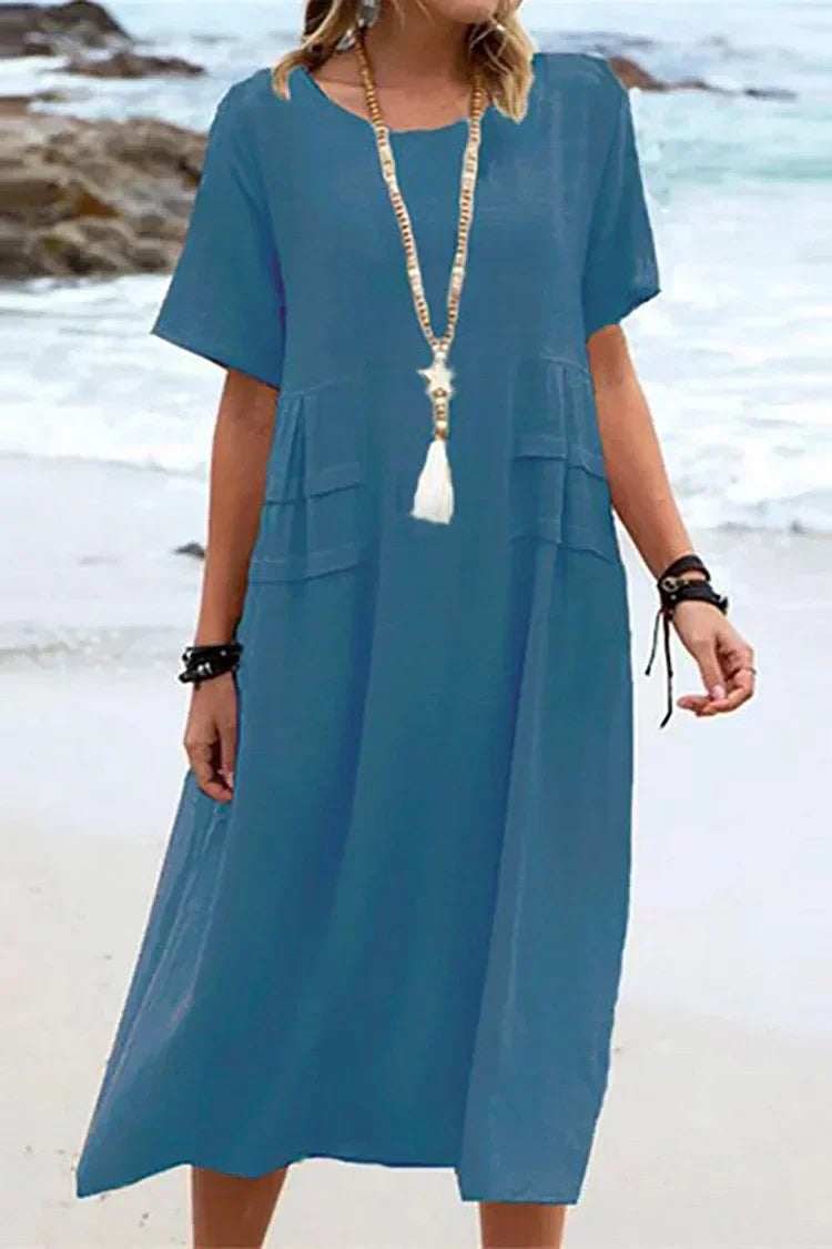 Loose, short-sleeved casual dress with a round neckline and plain colors