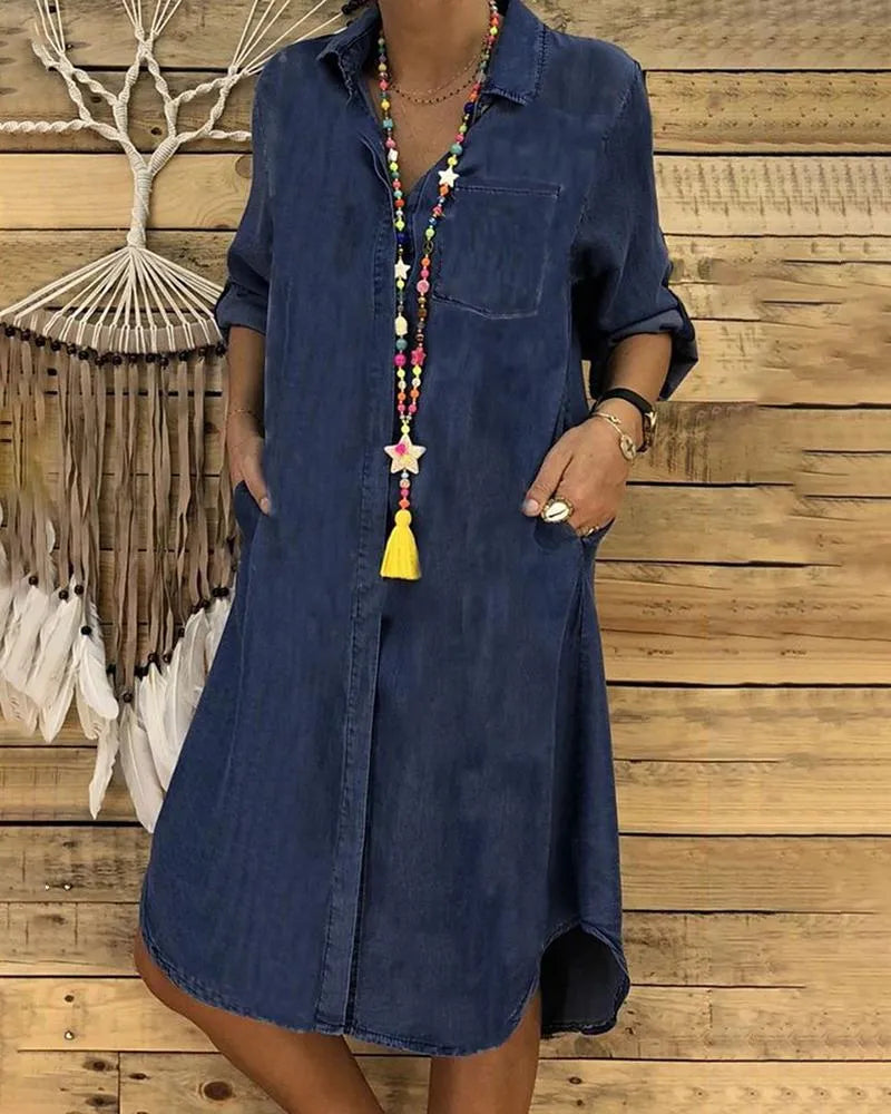 Denim midi dress with rolled-up sleeves and a chest pocket.