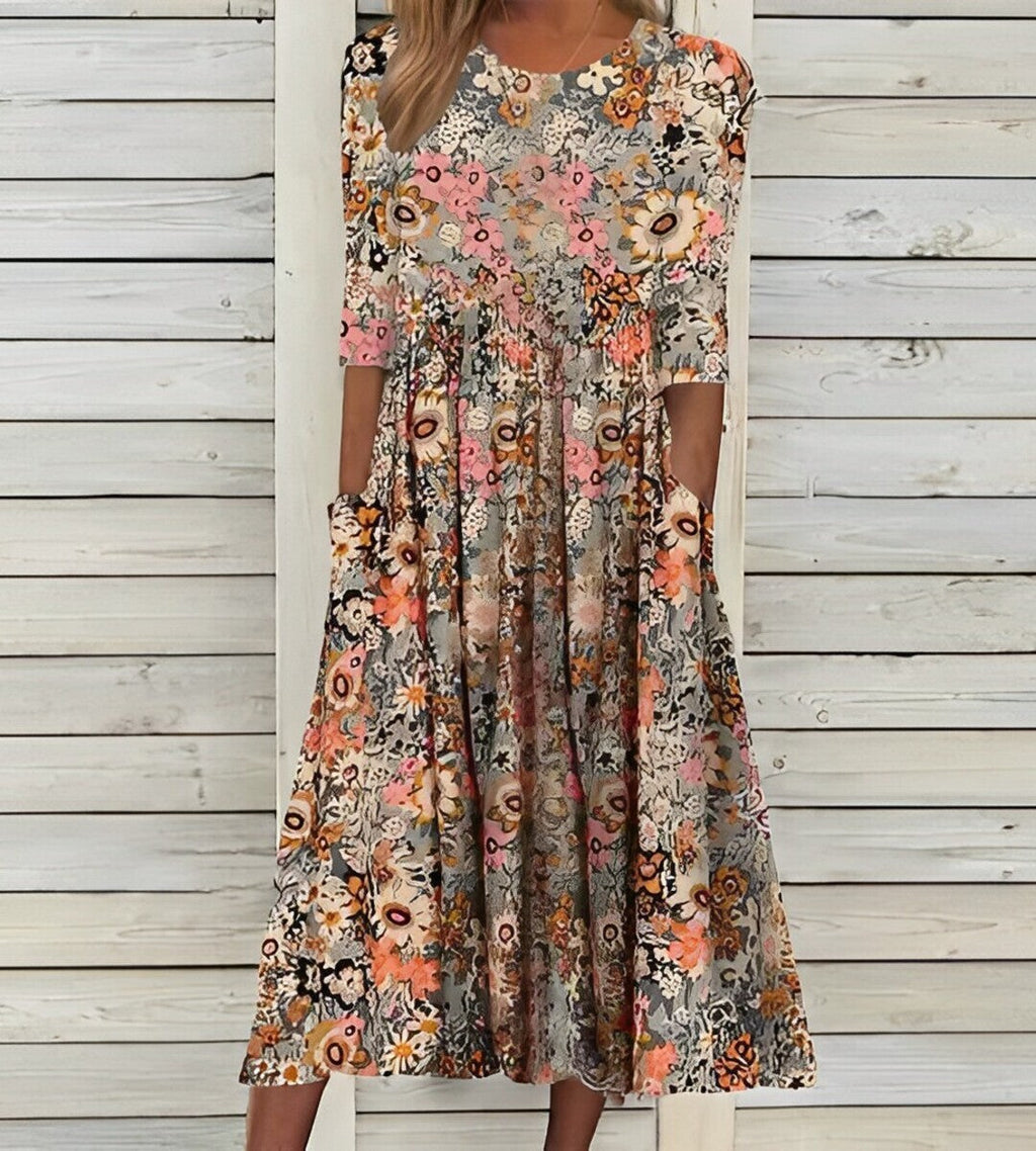 Printed midi dress with round neckline and pockets
