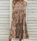 Printed midi dress with round neckline and pockets